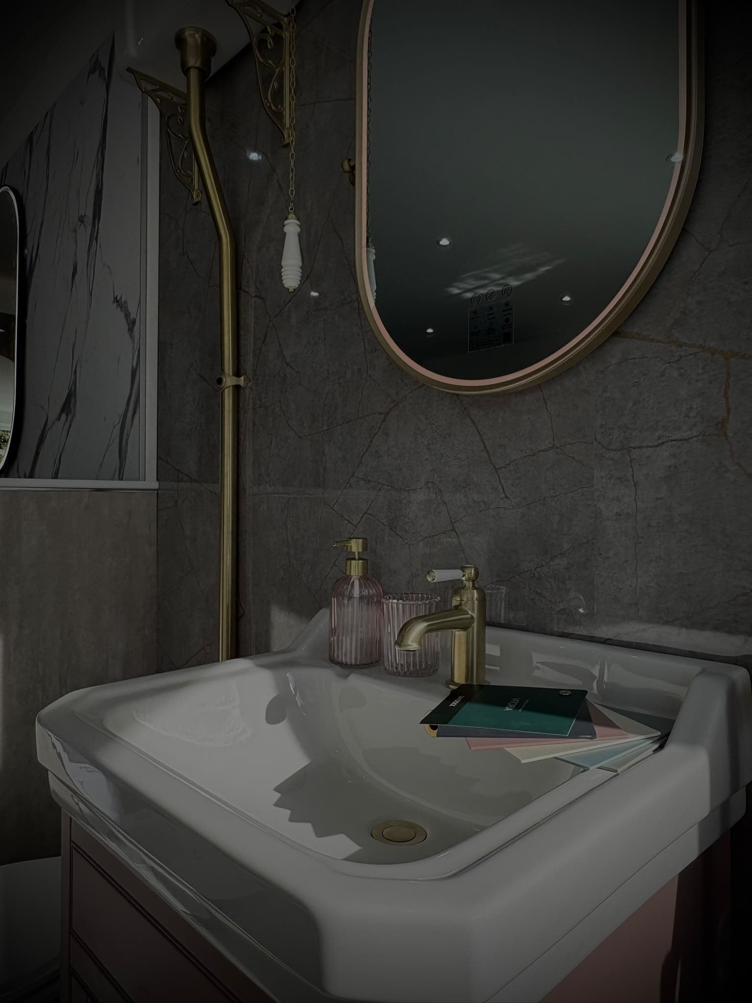 Traditional ceramic basin with brushed brass lever tap and fluted glass accessories