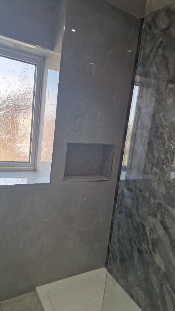 Tiled niche feature in luxury bathroom refurbishment in Mexborough