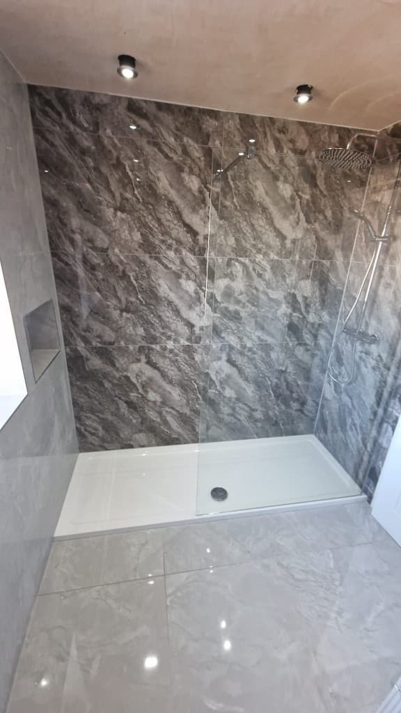 Walk-in shower with glass screen for easy access