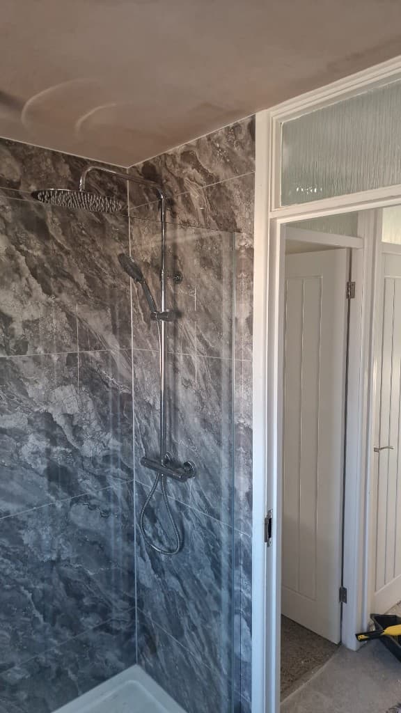 Rainfall shower installation in premium bathroom project